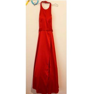 Red and long formal dress with an open back
